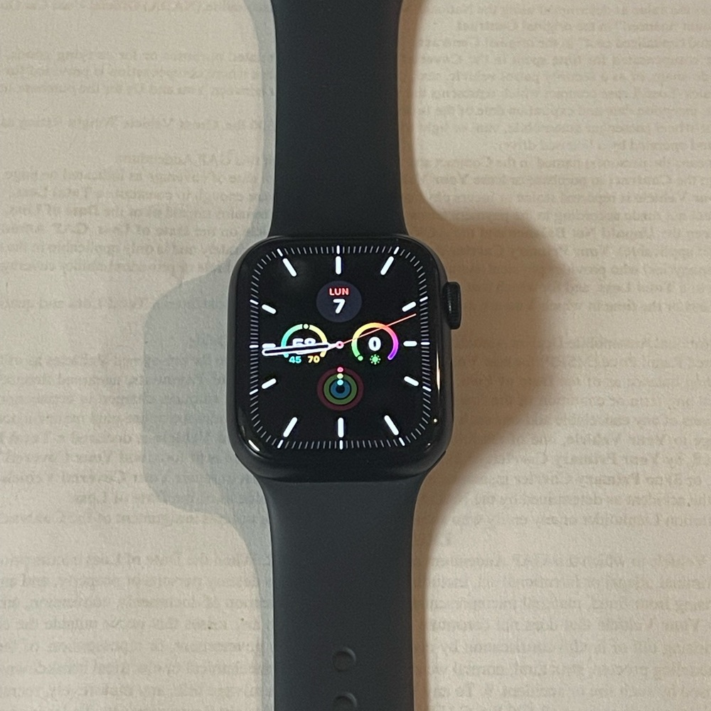 Apple Black Smartwatch with Minimalist Analog Display